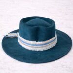 Teal wide brim felt hat with blue ribbon and textured ivory band